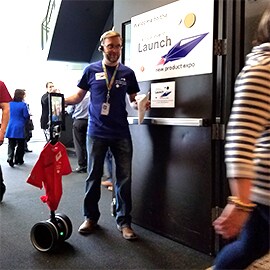 A robot interacting with employees at the 3M Tech Foru Annual Event.