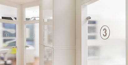 3MTM Glass Finishes conceal the view through a window in a hospital while still letting light through.
