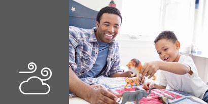 Father and son playing
