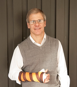 scientist Matt Scholz, wearing his invention, a 3M Scotchcast